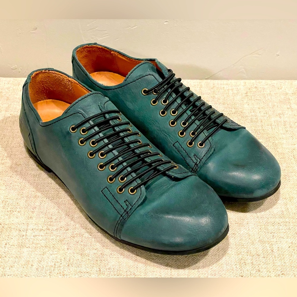 John Fluevog turquoise shoes with elastic lace details